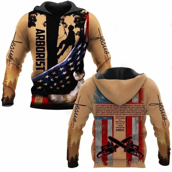 A marketing image of a hoodie featuring the same Jesus sleeves shown above, but with American flags on both the front and the back, crossed chainsaws, and a silhouette of a person in a helmet tethered to a tree trunk.