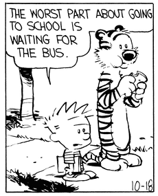 Calvin stands on the sidewalk with a book under his arm; Hobbes stands next to him, eating a sandwich. A slightly annoyed Calvin says, “The worst part about going to school is waiting for the bus.”
