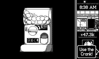 A gachapon machine on a black background. A notice in the corner points to the right edge of the screen and says 'Use the Crank!'
