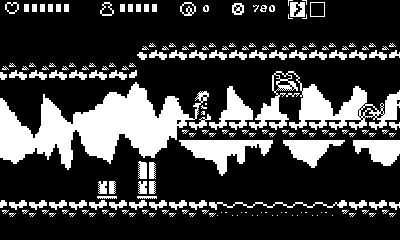 A screenshot of Castle Tintagel; Gawain is in a narrow cavern as a large frog hops toward him.